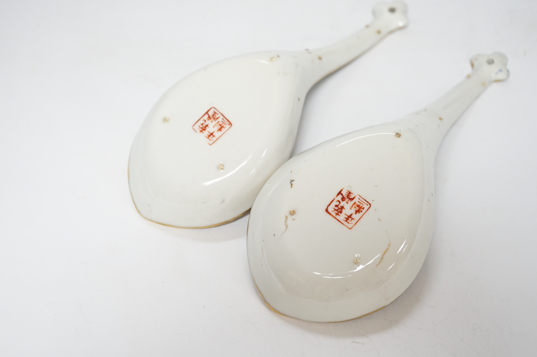 A pair of mid 20th century Chinese enamelled porcelain spoons, 21cm